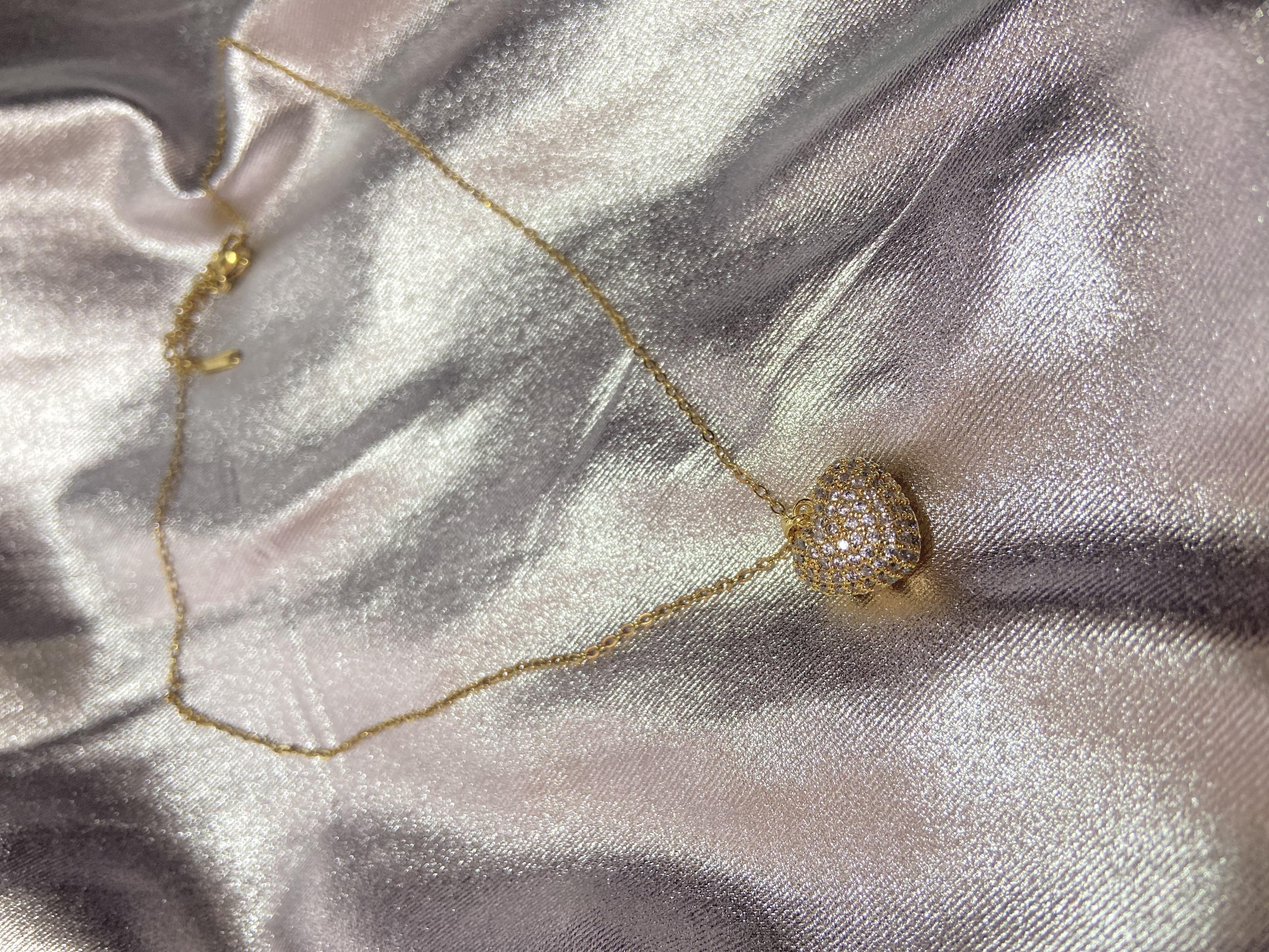 Kalpli Zirkon Taşlı Gold Çelik Kolye