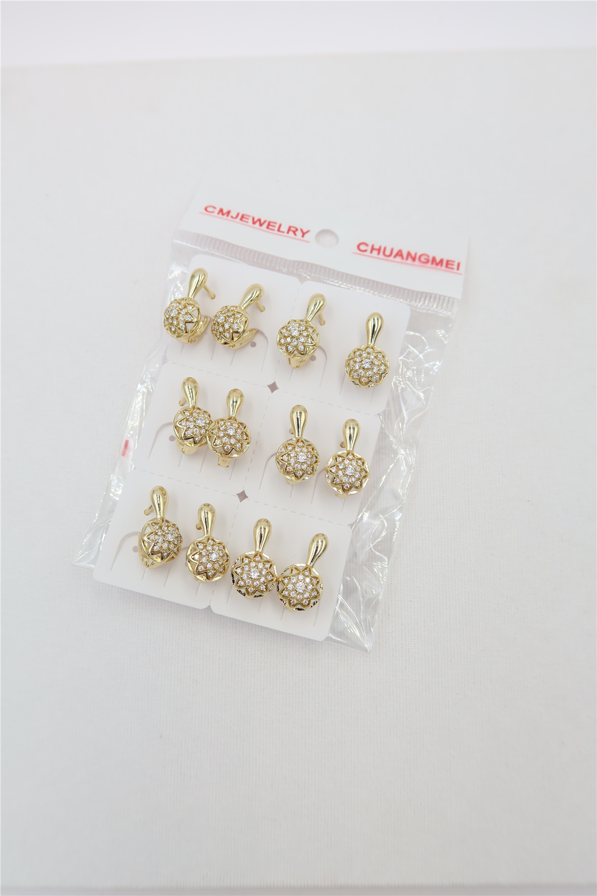 CM Küpe