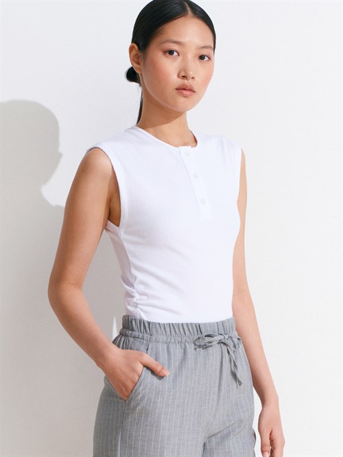 Wholesale Womens White Sleeveless Top with Button-Up Half Placket