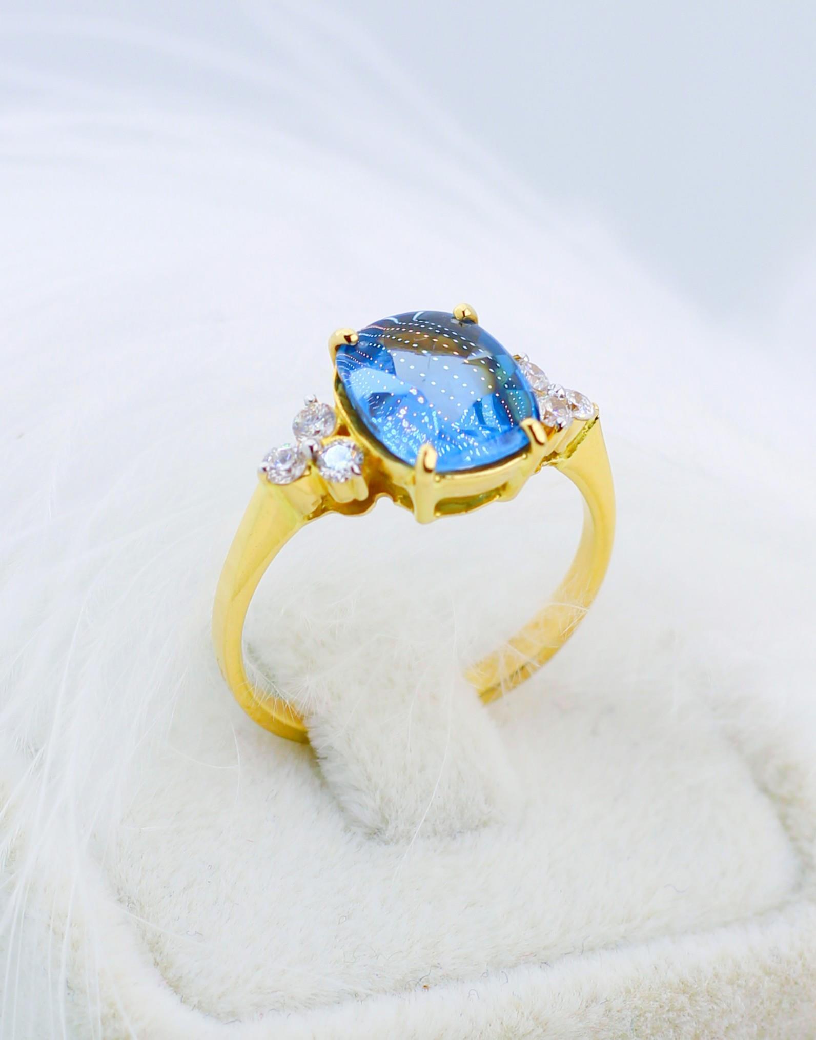 Blue Topaz Stone Diamond Ring 14 Carat