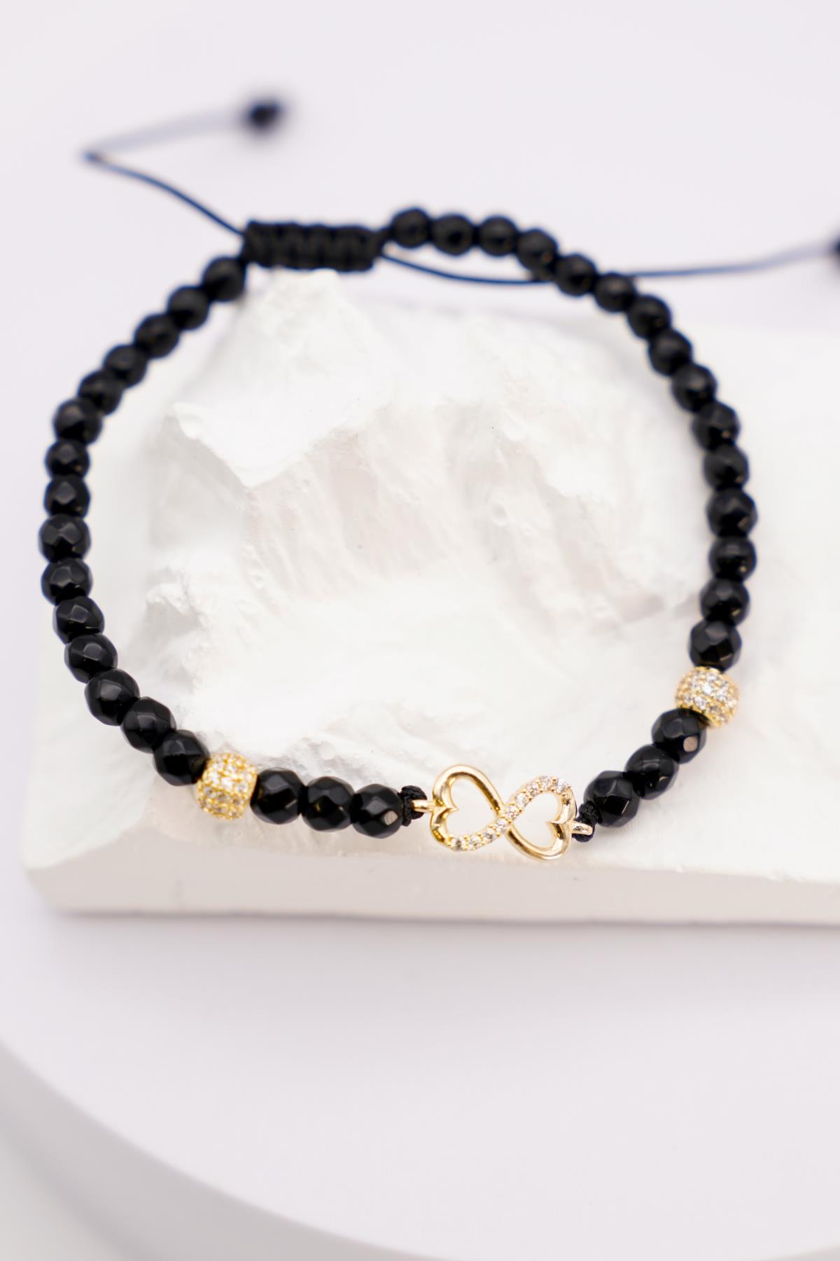 Siyah Oniks Boncuklu 14 Ayar Sonsuzluk Figürlü Ayarlanabilir Altın İp Bileklik – Zarif Tasarım