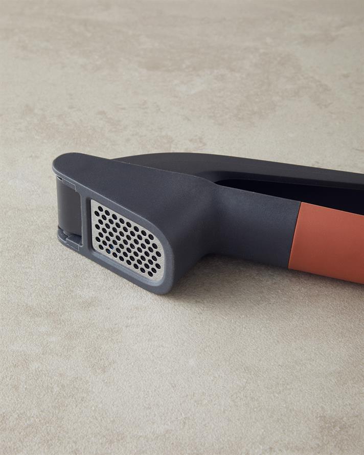 Pelle Paslanmaz Çelik Sarımsak Ezici 18 cm Turuncu