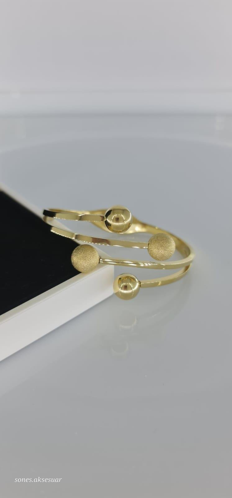 Altın Renk Dört Sıra Dorika Toplu Bilezik c120Dorika Toplu Altın Renk Bilezik C120 | Zarif ve Modern Tasarım