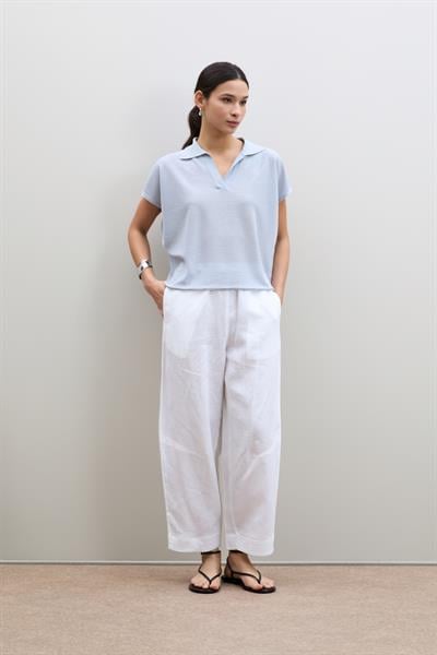 Вязанный свитер с пайетками и воротником-поло