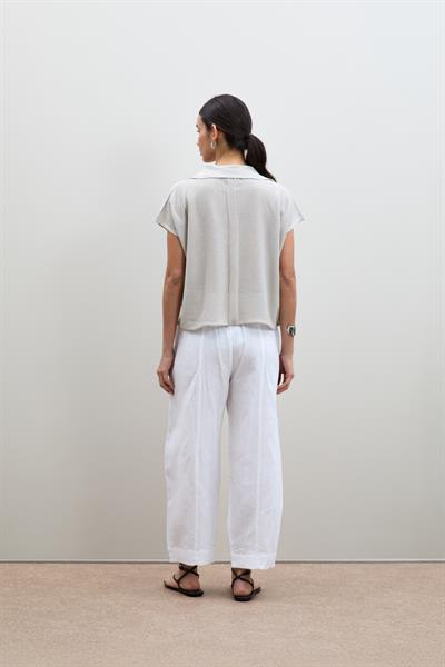 Вязанный свитер с пайетками и воротником-поло