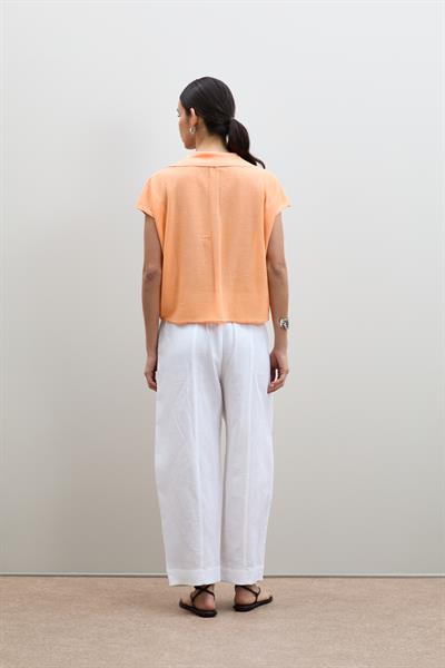 Вязанный свитер с пайетками и воротником-поло