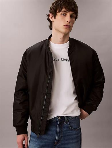 Calvin Klein Erkek Normal Kalıp Yuvarlak Yaka Pamuklu Logo Detaylı Kısa Kollu Beyaz T-Shirt LV04LD230G-YAF