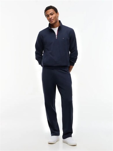 Tommy Hilfiger Erkek Regular Fit %100 Pamuk Havlu Kumaş Beli Bağcıklı Fermuarlı Cepli Şerit Detaylı Mavi Eşofman Altı MW0MW44991-DUR