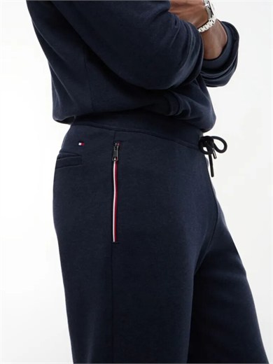 Tommy Hilfiger Erkek Regular Fit %100 Pamuk Havlu Kumaş Beli Bağcıklı Fermuarlı Cepli Şerit Detaylı Mavi Eşofman Altı MW0MW44991-DUR