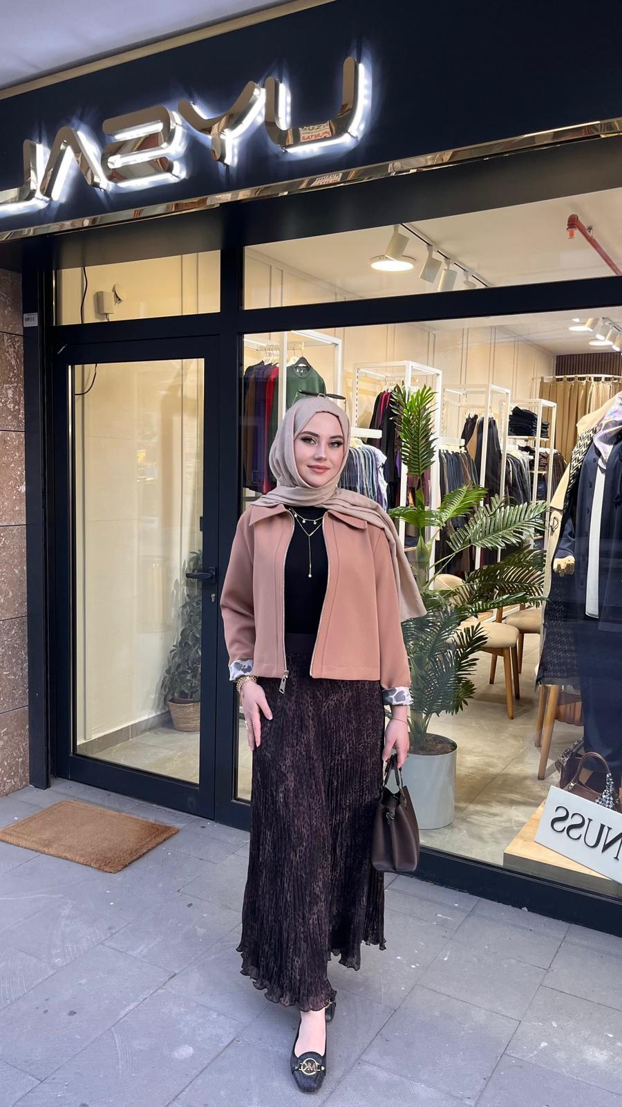 TİCİMAXPantolonYusuf ÖzdemirUYT0003772Yusuf ÖzdemirYusuf Özdemir 1504 Leopar Kırıştırma Etek Kahve