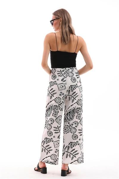 Kadın keten karışımlı siyah-beyaz desenli beli lastikli palazzo pantolon - Charamela