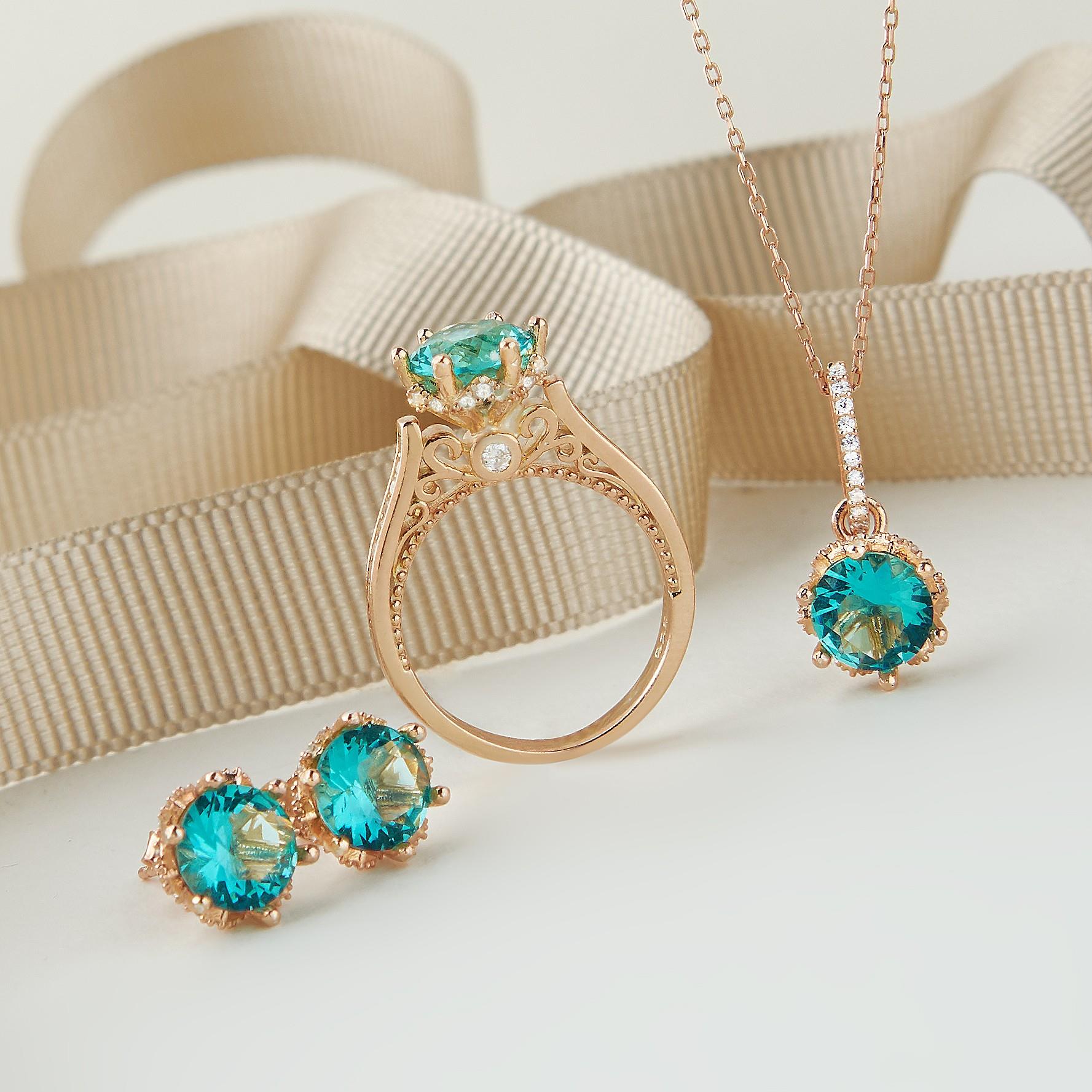 925 Ayar Gold  Rose Kaplama Efsane Model  Aquamarin Taşlı Üçlü Gümüş Set