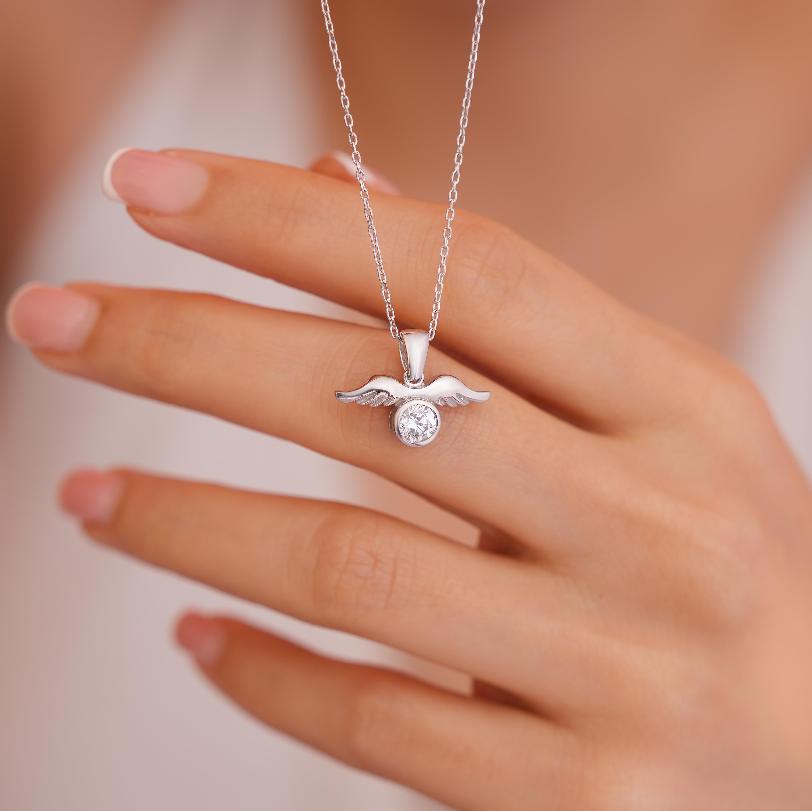 925 AYAR RADYUM KAPLAMA SWAROVSKİ TEK TAŞLI  MELEK KANADI GÜMÜŞ KOLYE