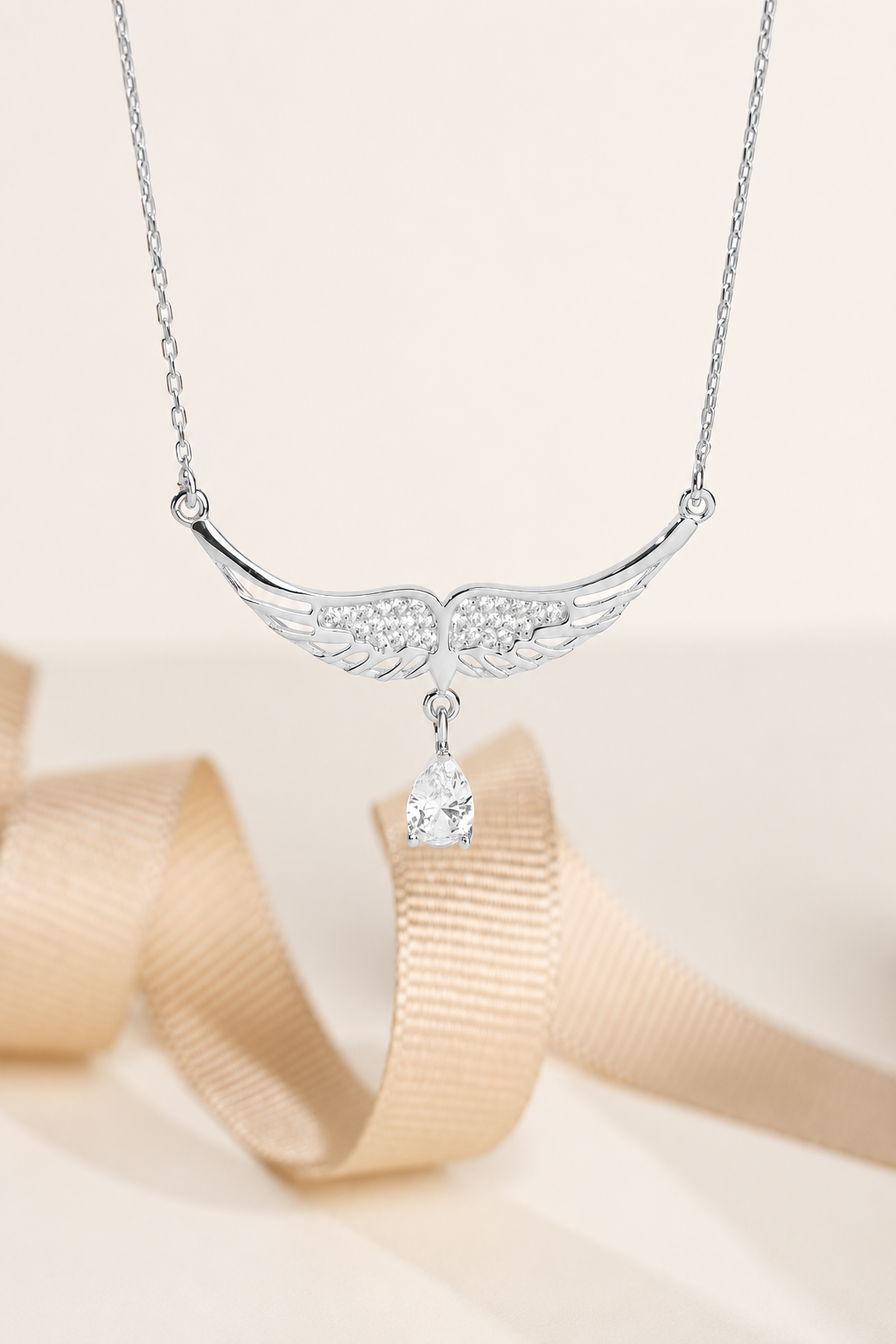 925 AYAR RODYUM KAPLAMA SWAROVSKİ TAŞLI MELEK KANADI GÜMÜŞ KOLYE