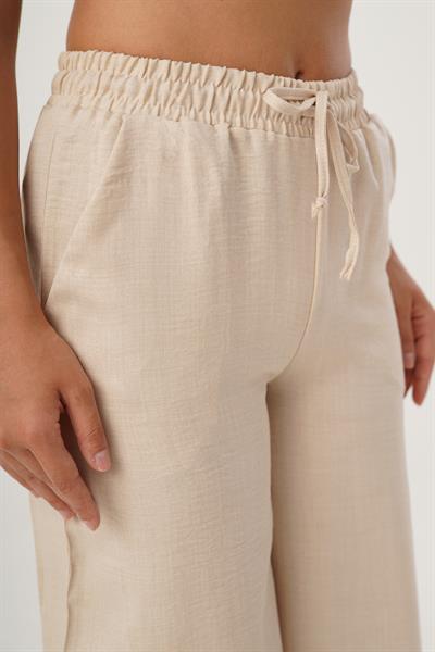 Beli Lastikli Bol Paça Bej Keten Pantolon