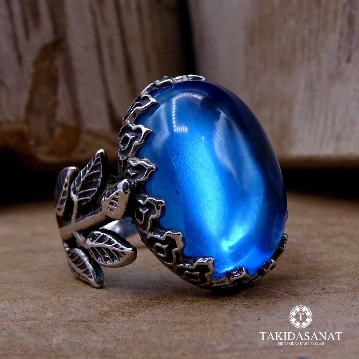 Kubbeli Oval Kesim Ateş Mavisi Taşlı Gümüş Bayan Yüzük
