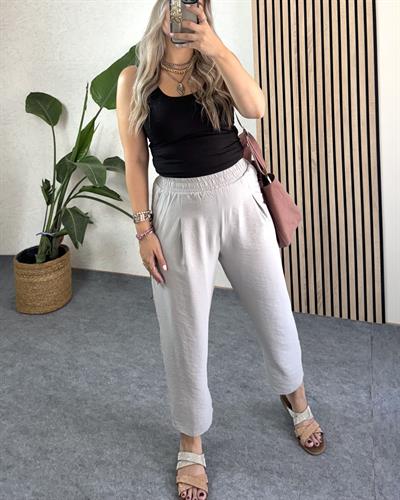 Gri renk pileli beli lastikli cepli pantolon
