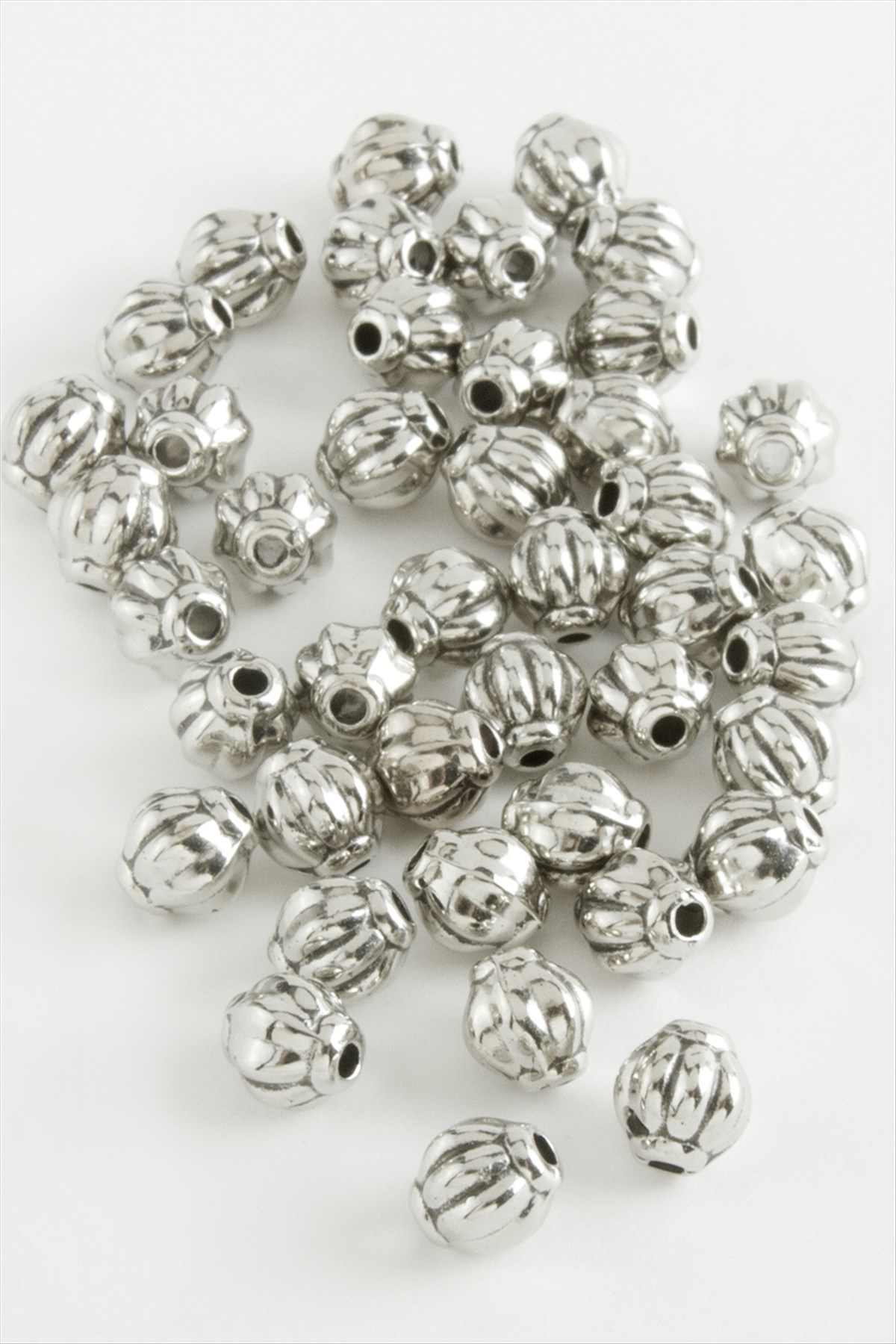 0,6 mm Çizgili Oval Plastik Tesbih Püskül Ara Aparatı 50 Gram