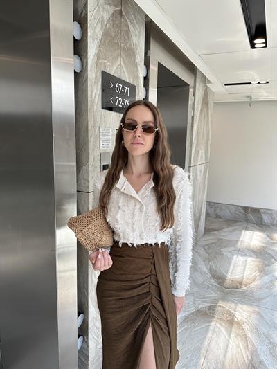 PÜSKÜL DETAYLI KREM DÜĞMELİ HIRKA