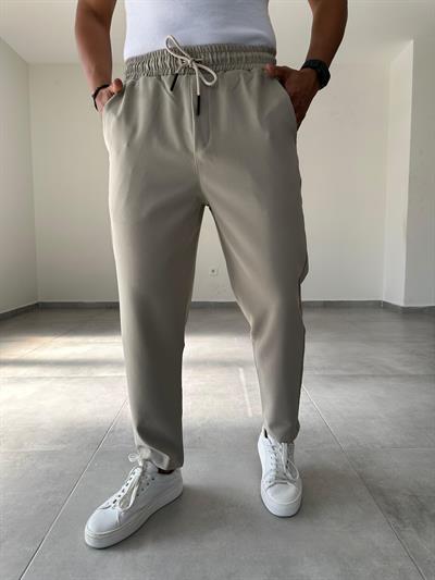 Bej Renk Bel Kısmı Lastik Ve Bağcık Detaylı Jogger