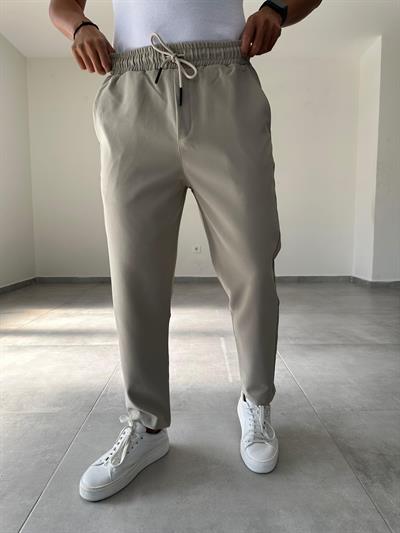 Bej Renk Bel Kısmı Lastik Ve Bağcık Detaylı Jogger