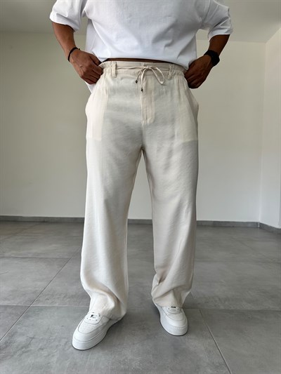 Tensel Kumaş Bel Kısmı Lastik Ve Bağcık Detaylı Bej Renk Baggy Pantolon