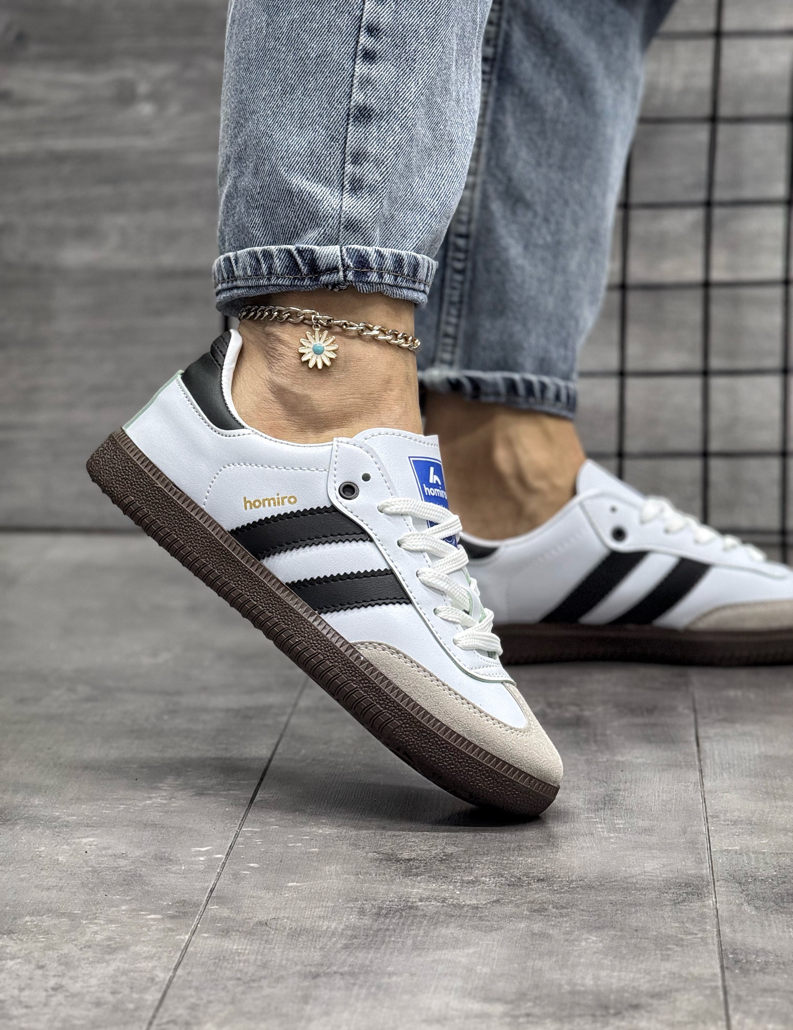 Homiro.com.tr'de en trend Unisex Bağcıklı Spor Ayakkabı modellerini bulabilirsin. Beyaz ve siyah renk seçenekleri ile tarzını tamamla!