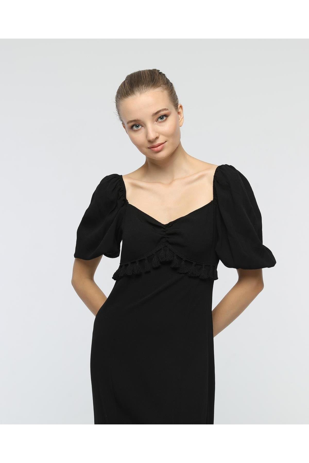 Göğsü Püsküllü Yırtmaçlı ElbiseKADIN ELBİSE