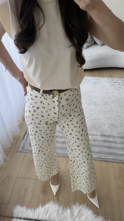 ÇİÇEK DESENLİ KREM RENGİ KESİK PAÇA JEAN 
