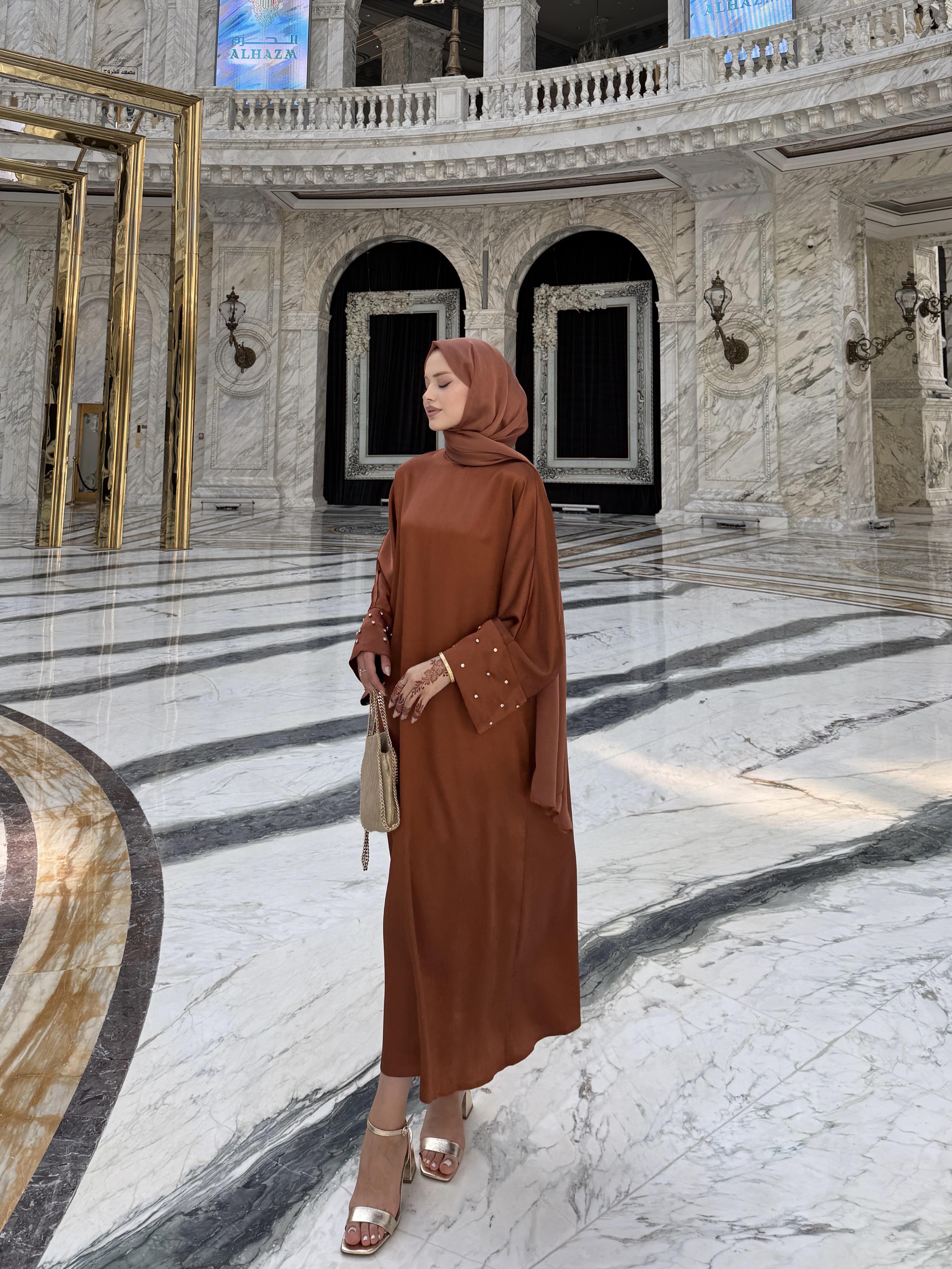 Doha Elbise Tarçın