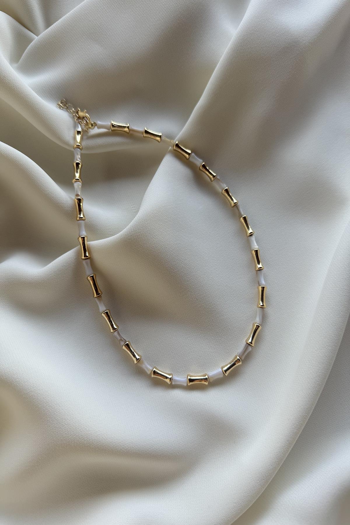 KREM KEMİK GOLD DETAY MİNİMAL KOLYE