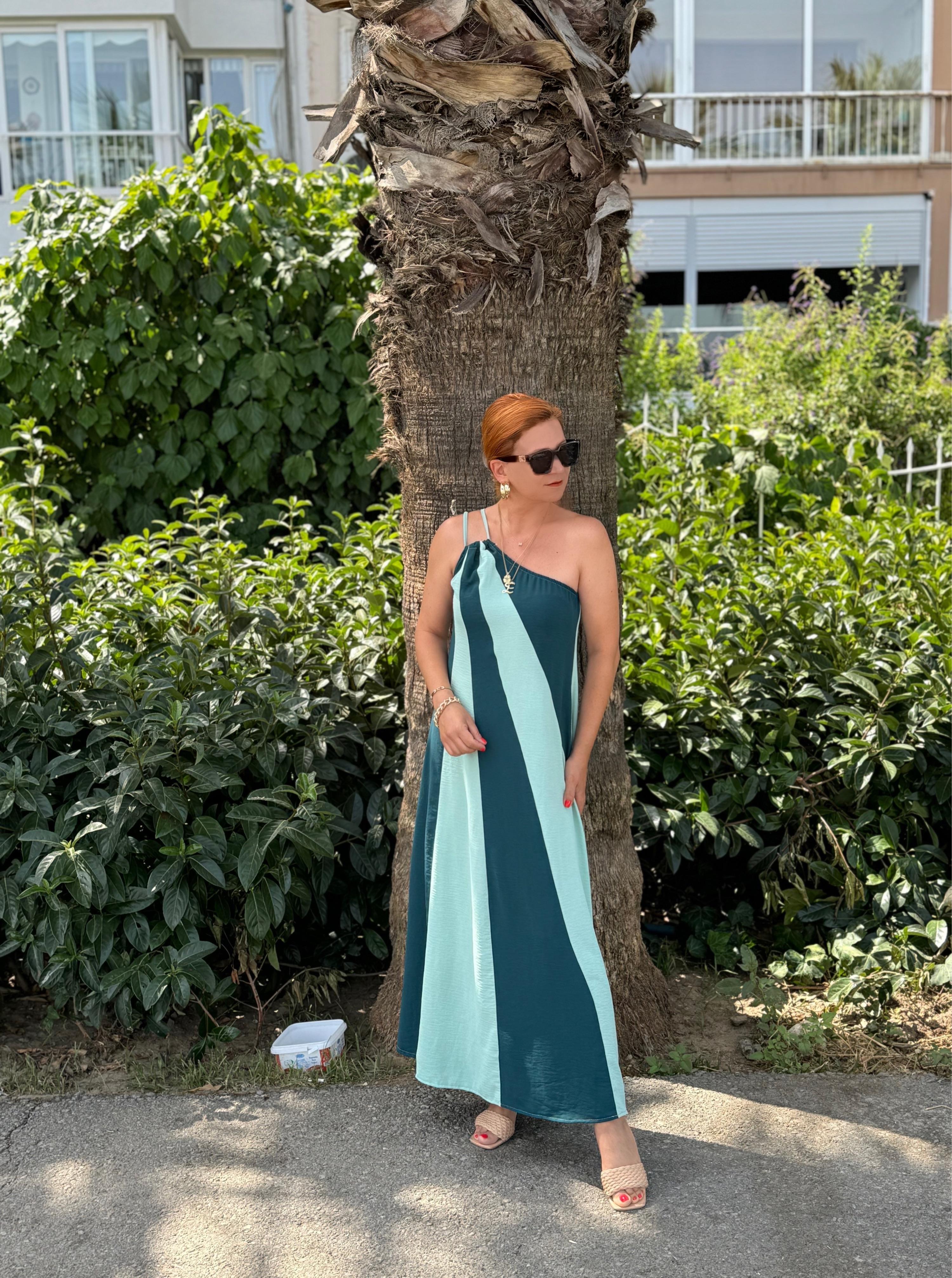 77302(Bir beden küçük alınız) ORJ MARKA TEK OMUZ AEROBIN ELBİSE boyum 1.64