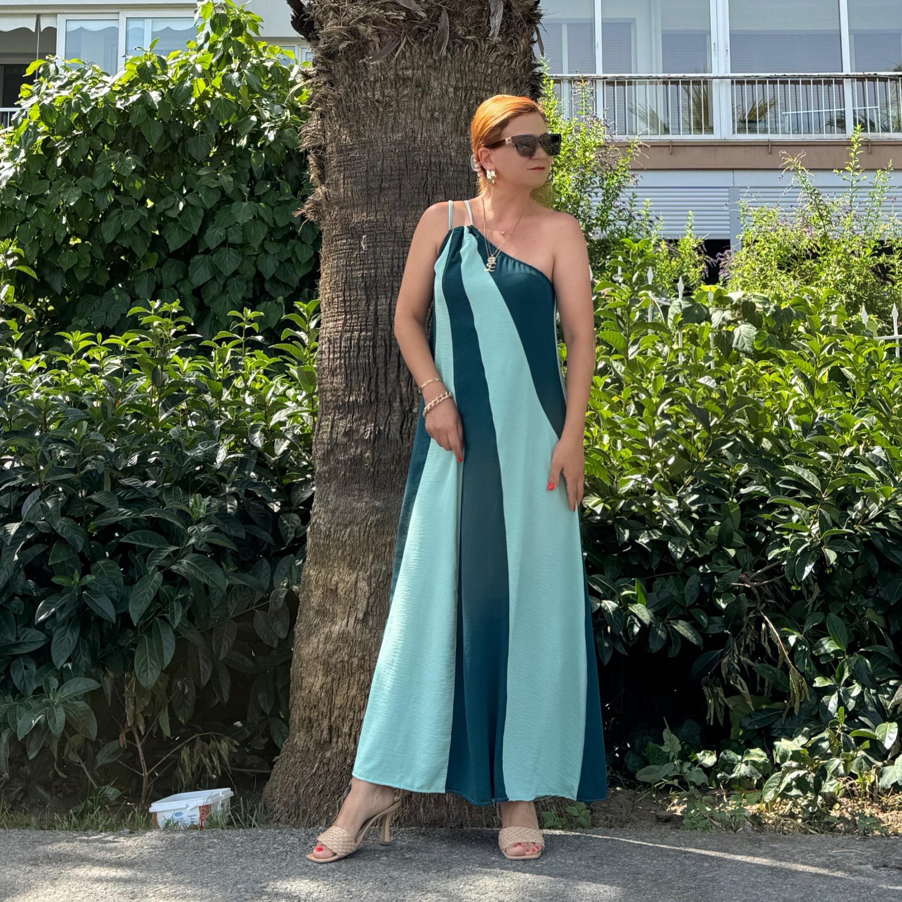 77302(Bir beden küçük alınız) ORJ MARKA TEK OMUZ AEROBIN ELBİSE boyum 1.64