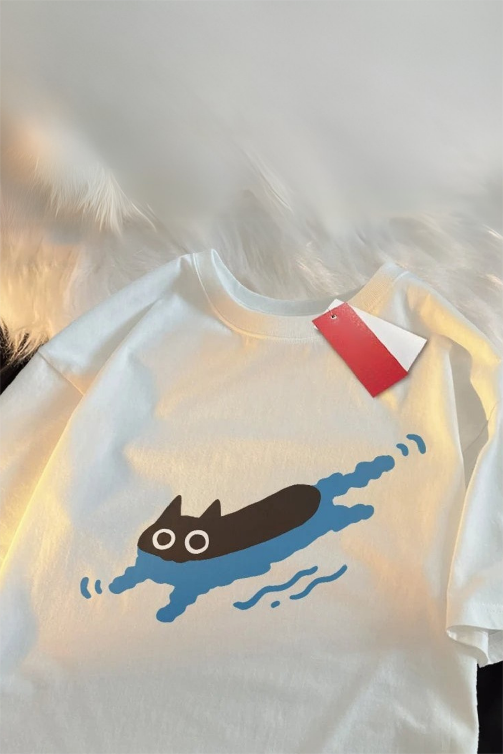 Ekru Swimming Cat Unisex T-shirt