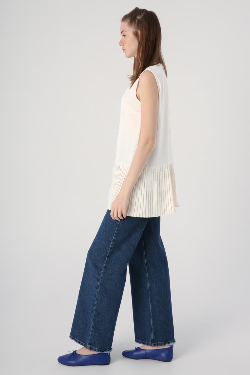 Ekru-Kolsuz Bisiklet Yaka Eteği Pileli Bluz