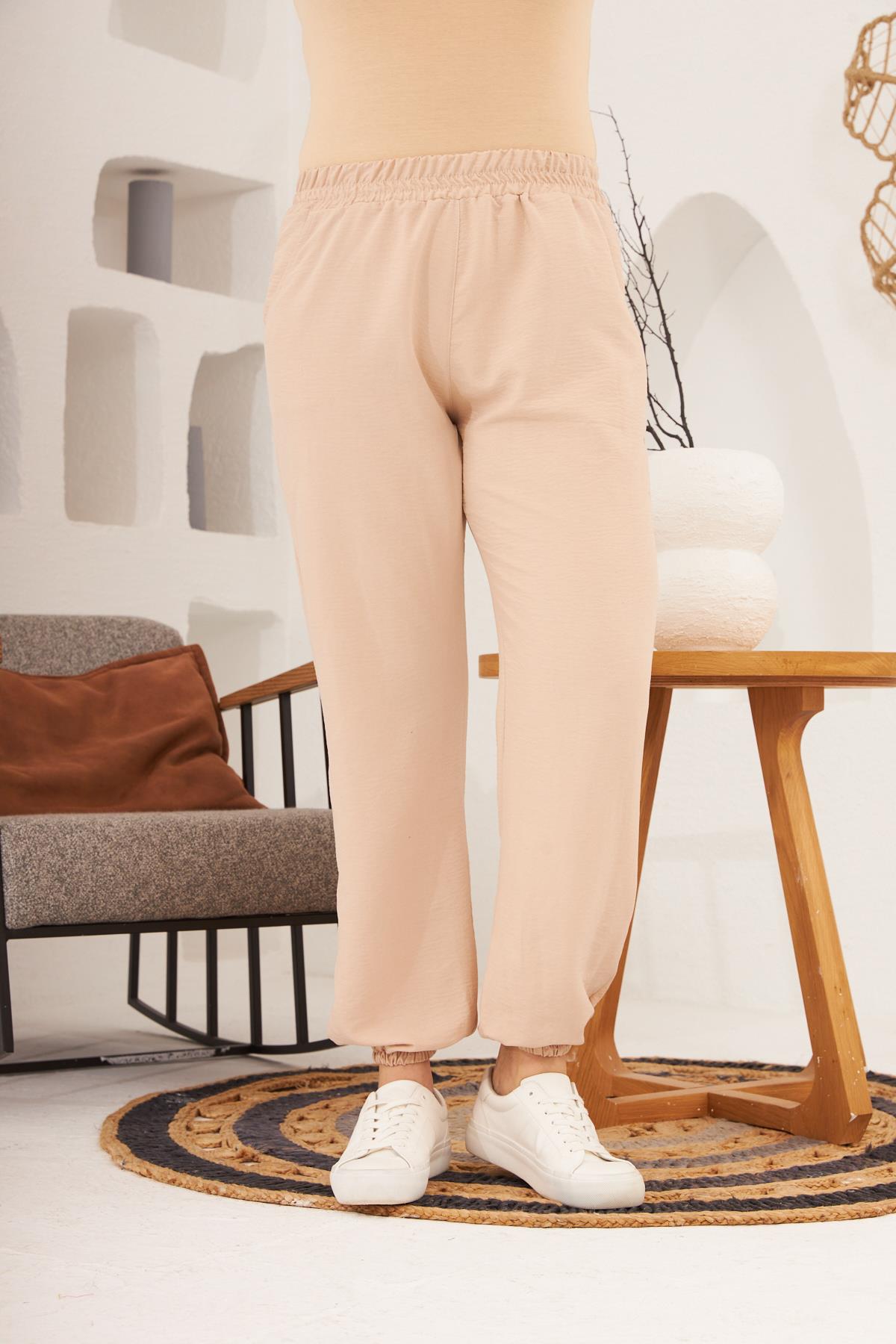 Bel ve Paça Lastikli Aerobin Büyük Beden Krem Pantolon