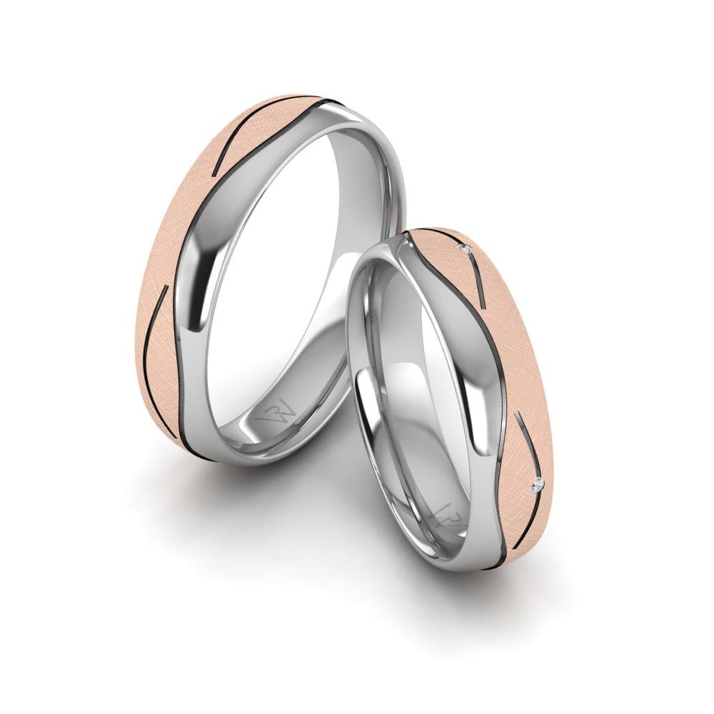 Eheringe mit Devotio-Weißgold- und rosa Dalloz-Kristallsteinen