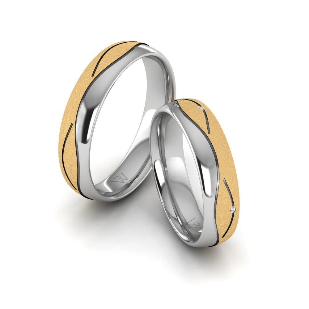 Eheringe mit Devotio-Weißgold- und gelben Dalloz-Kristallsteinen