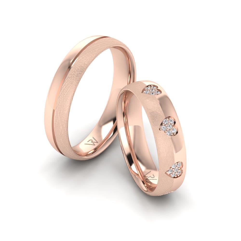 Eheringe mit Lovelica-Steinen, roségoldenem Dalloz-Kristall