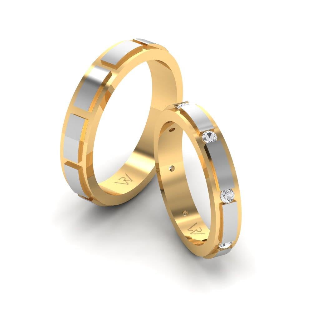 Eheringe mit Lovewhisper-Steinen aus Gelbgold und weißem Dalloz-Kristall