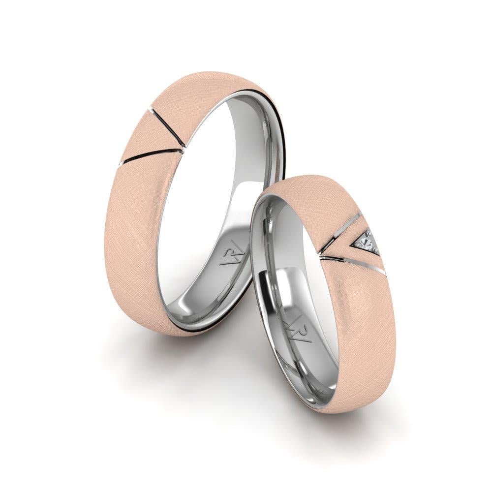 Eheringe mit Shineify-Weißgold- und rosafarbenen Kristallsteinen von Dalloz