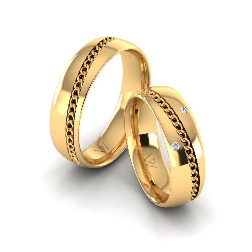 Eheringe mit Steinen UnityEssence Gelbgold Dalloz-Kristall