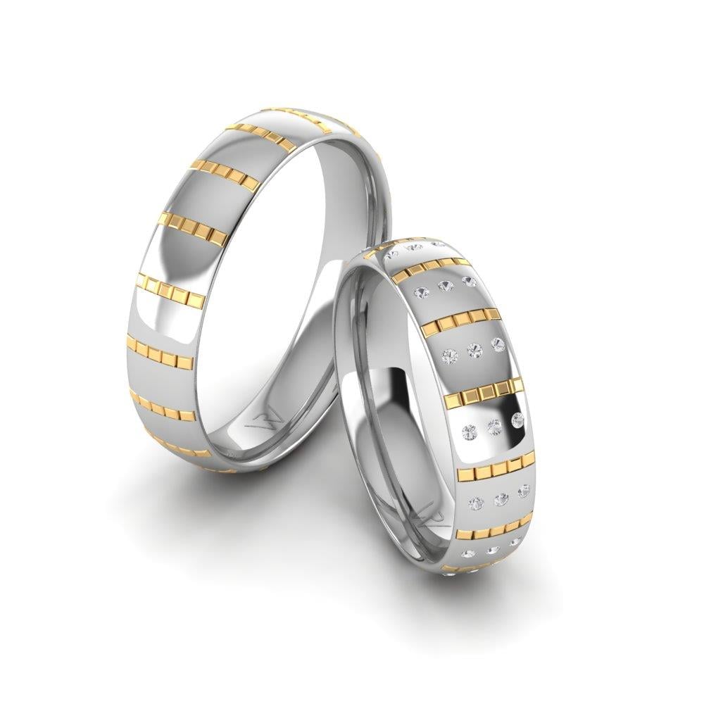 Eheringe mit Blissbond-Steinen aus Weißgold und gelbem Dalloz-Kristall