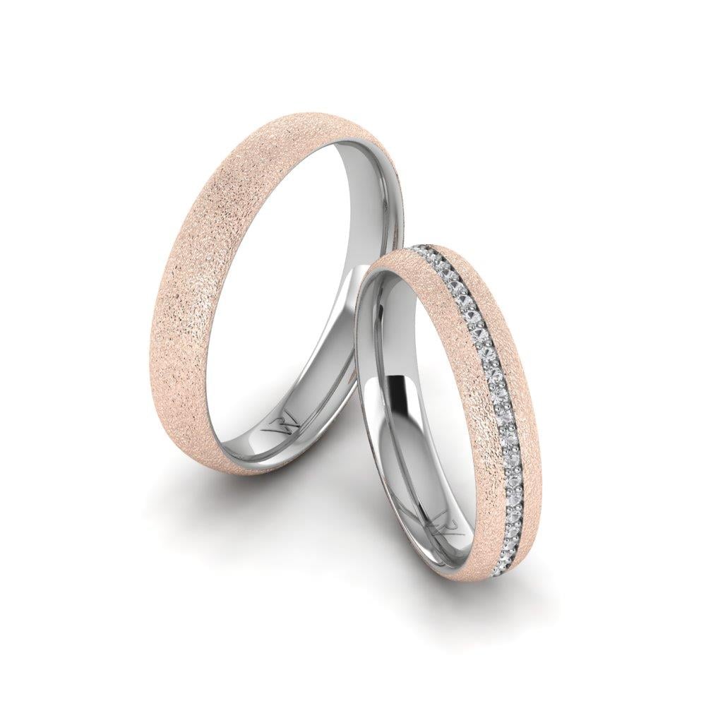 Eheringe mit Dreamspire-Weißgold- und rosafarbenen Dalloz-Kristallsteinen