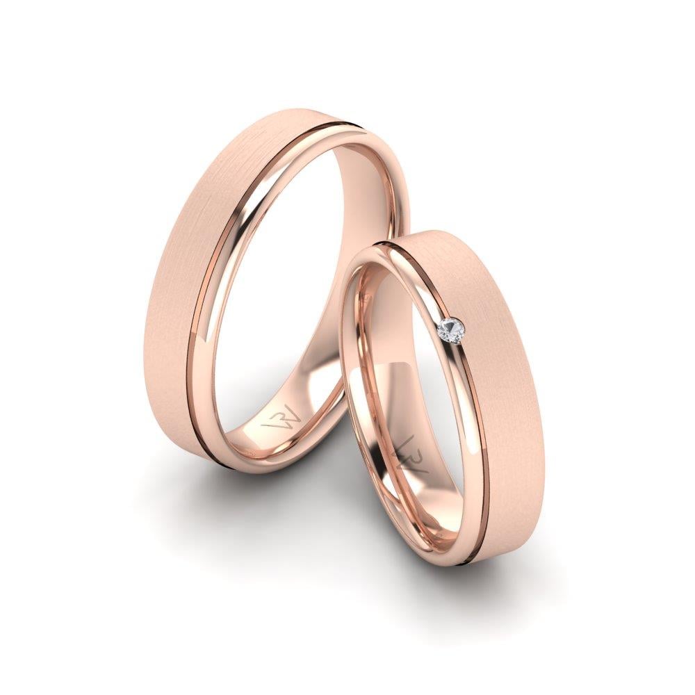 Eheringe mit Steinen Enchantla Roségold Dalloz-Kristall