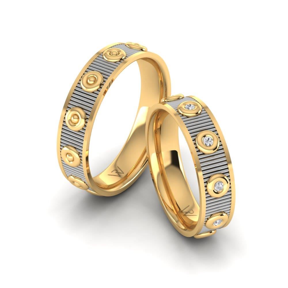 Eheringe mit Endlessio-Gelbgold- und weißen Dalloz-Kristallsteinen