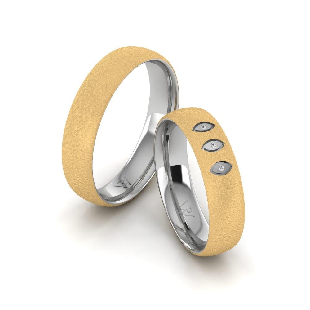 Eheringe mit Glimmera-Steinen aus Weißgold und gelbem Kristall von Dalloz