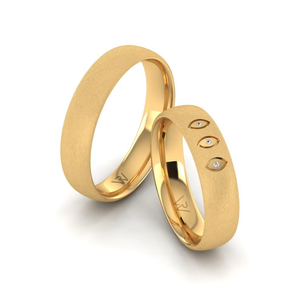 Eheringe mit Steinen Glimmera Gelbgold Dalloz-Kristall