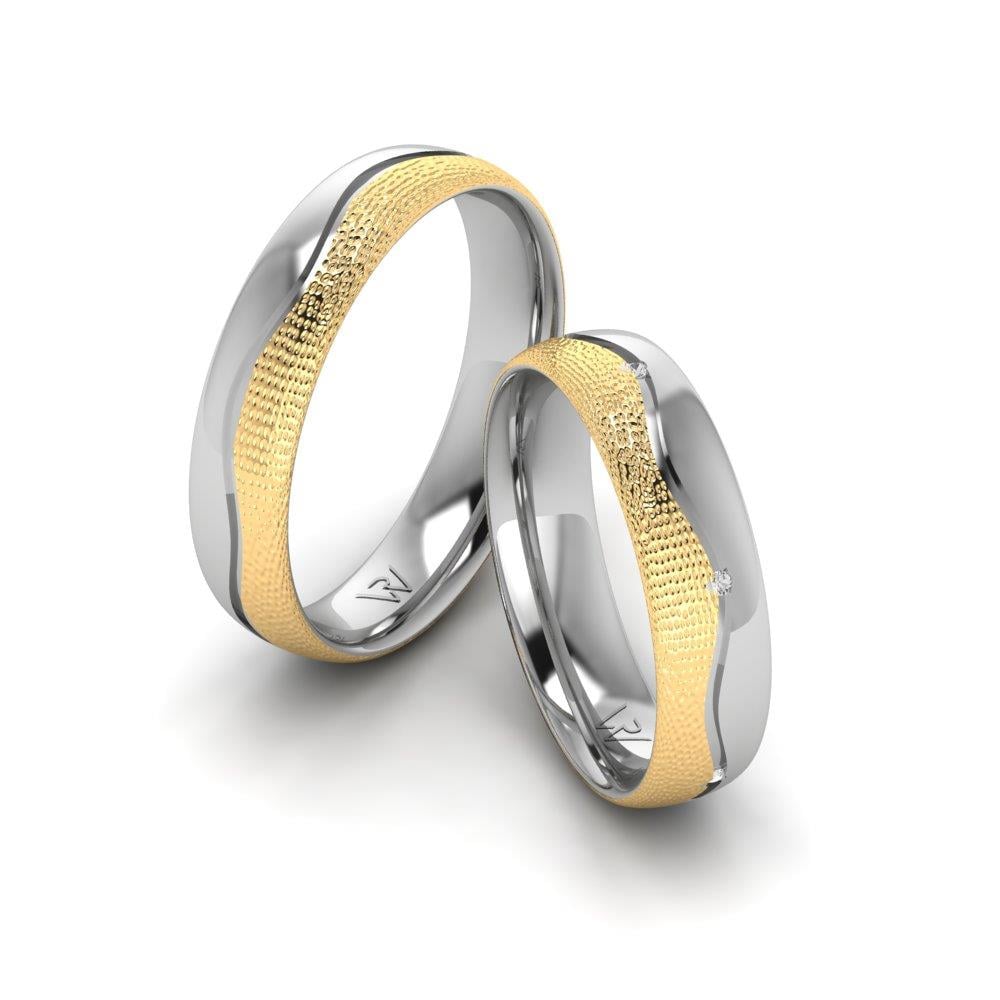 Eheringe mit HarmonyShimmer-Gelbgold und weißen Dalloz-Kristallsteinen