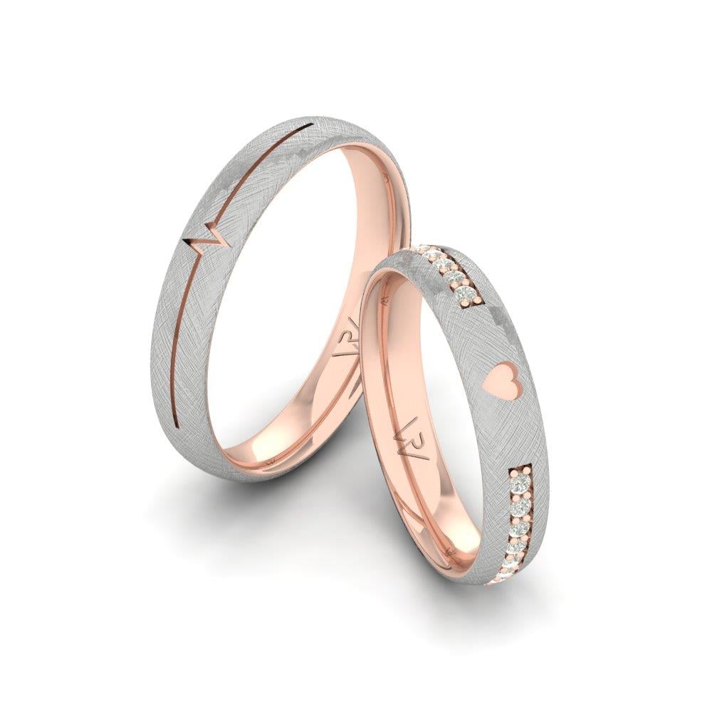 Eheringe mit Lustra-Steinen in Roségold und weißem Kristall von Dalloz